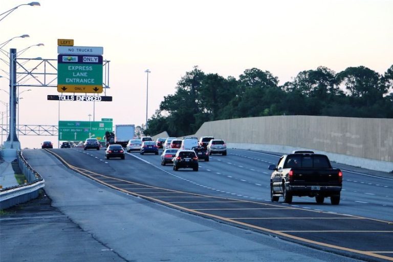 Dynamic message sign displaying real-time traffic information on a Florida highway