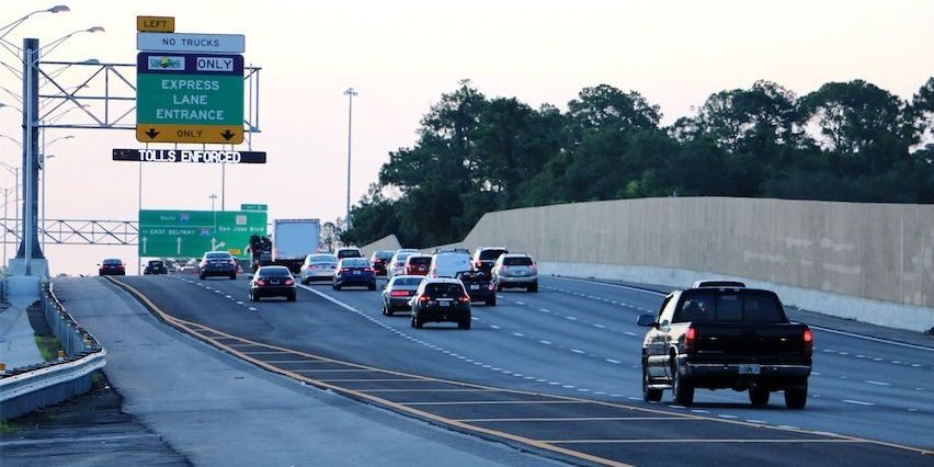Dynamic message sign displaying real-time traffic information on a Florida highway