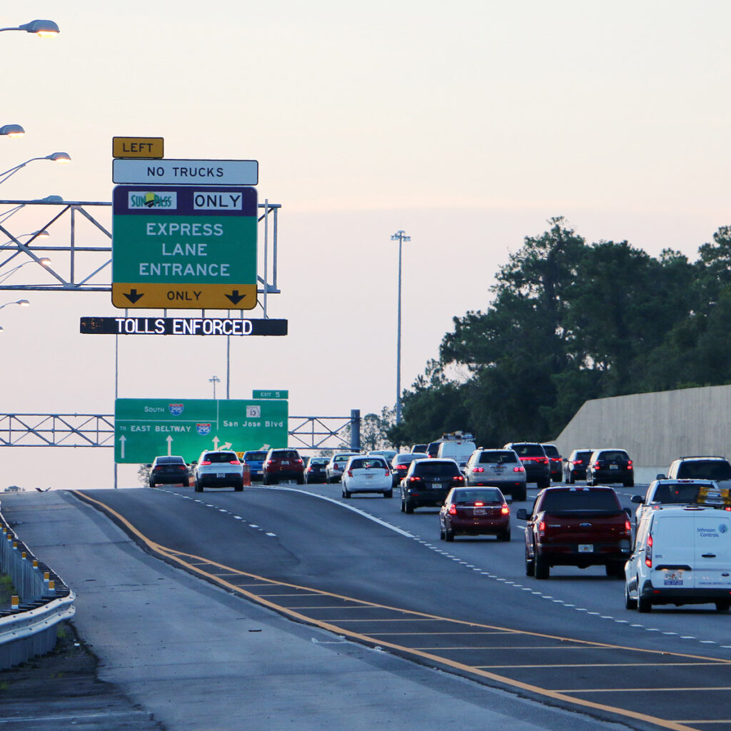 Traveler-Information Dynamic message sign displaying real-time traffic information on a Florida highway