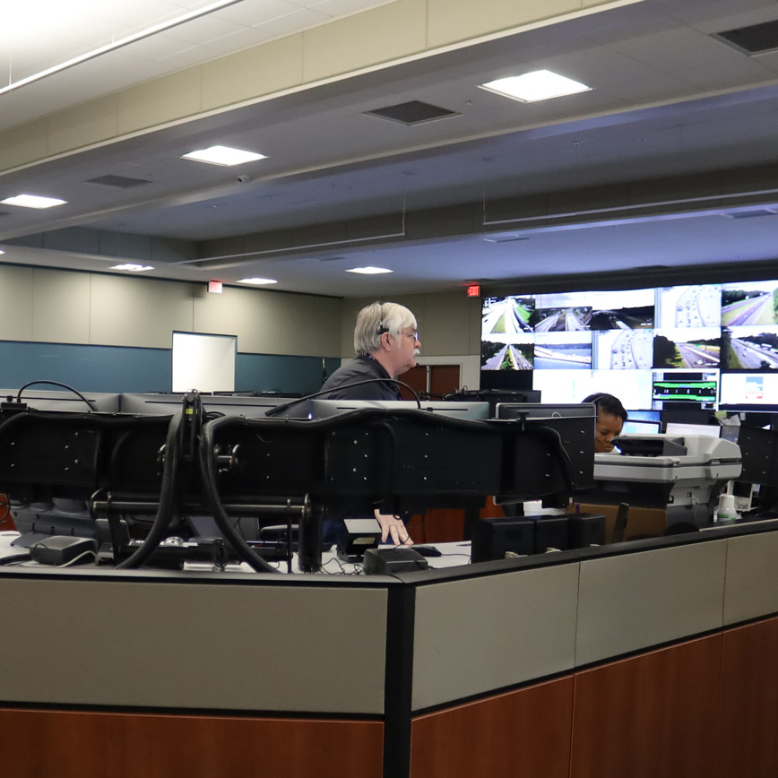 Traffic-Management RTMC operators monitoring traffic across Northeast Florida from a control room