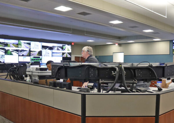 RTMC operators monitoring traffic across Northeast Florida from a control room